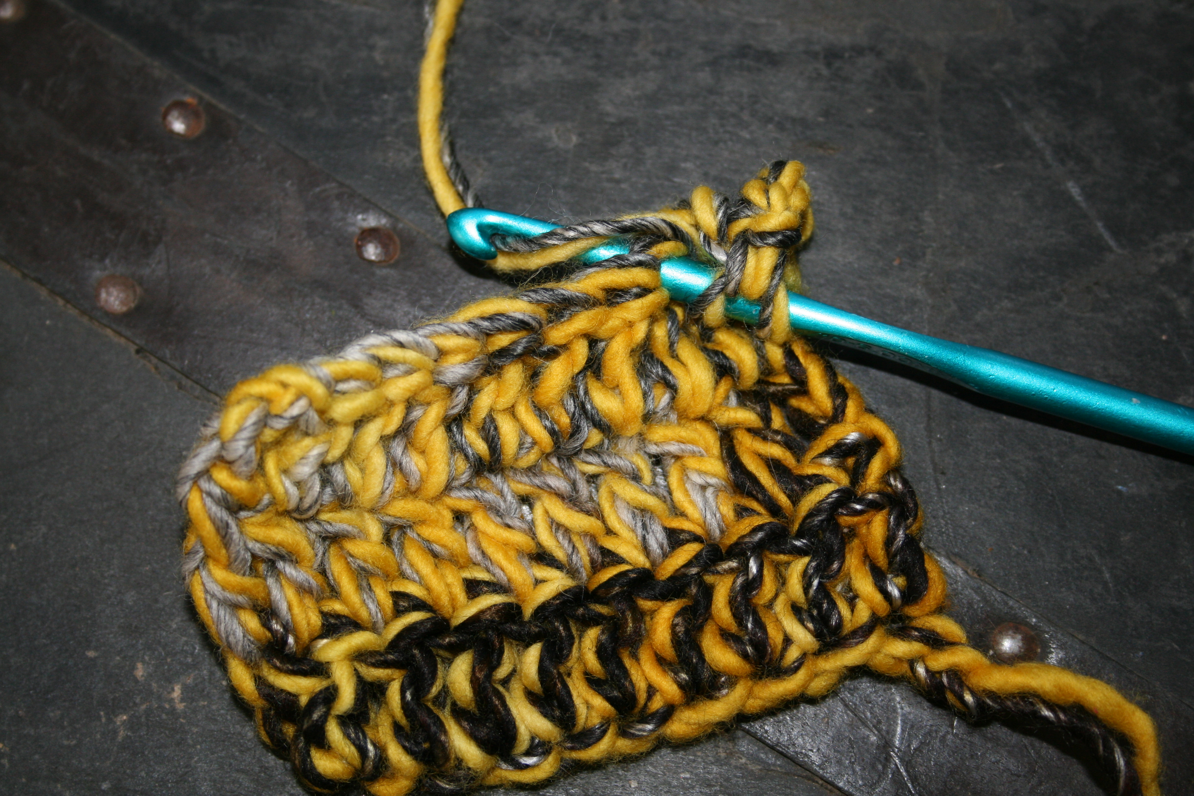 Using speckled yarn for accents and for larger knits